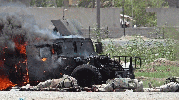 Three dead American soldiers outside their Humvee